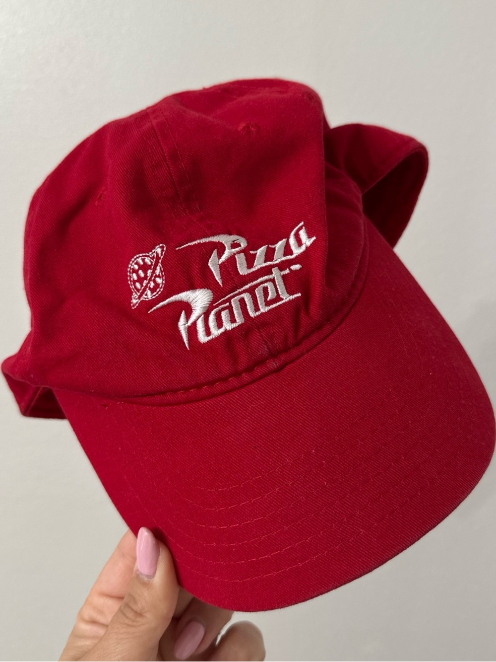 Toy Story Red Pizza Planet cap with white embroidered logo